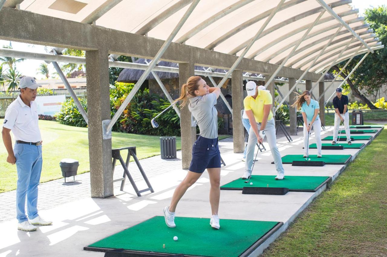 Constance Prince Maurice Poste de Flacq Екстер'єр фото Golfers practicing at a driving range